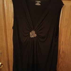 Black sleeveless top. Evening wear